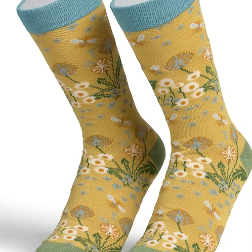 Pair of yellow socks with floral and bee pattern