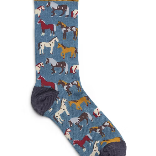 Bamboo socks with horse pattern on a blue background