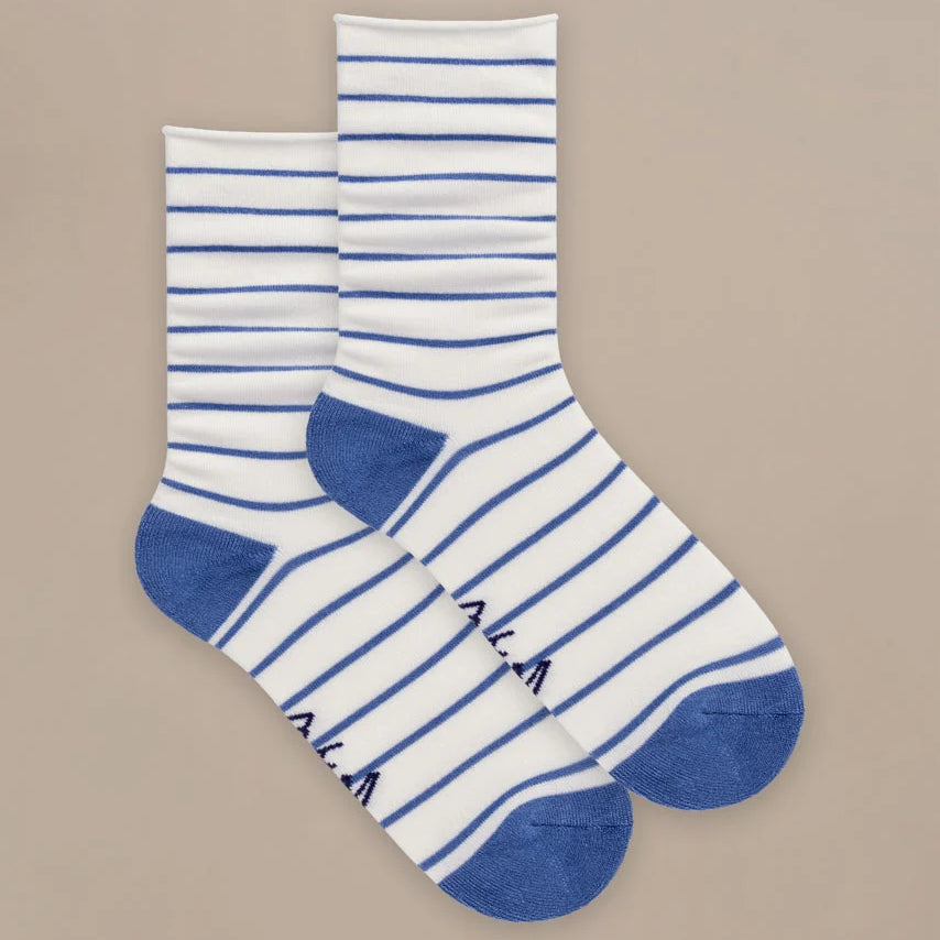 Pair of white socks with blue stripes and cuffs