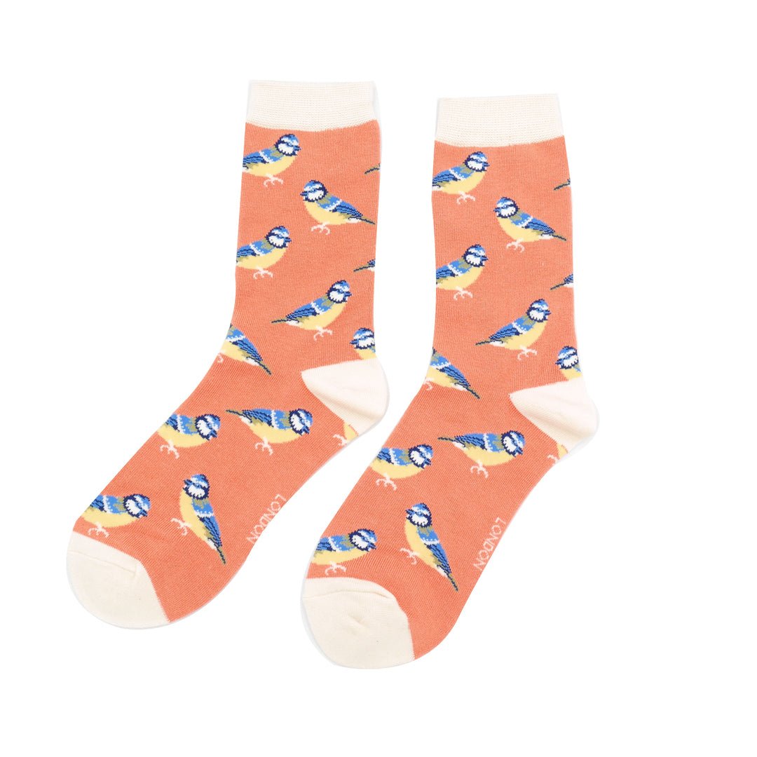Orange bamboo socks with blue tits