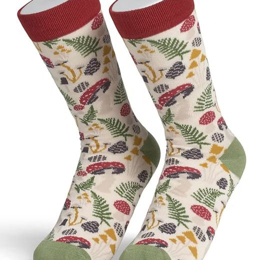 Pair of socks with a nature-themed pattern on a white background