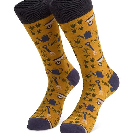 Pair of socks with gardening-themed design.