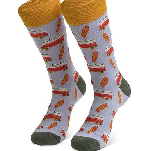 Pair of socks with a pattern of surfboards and campervans