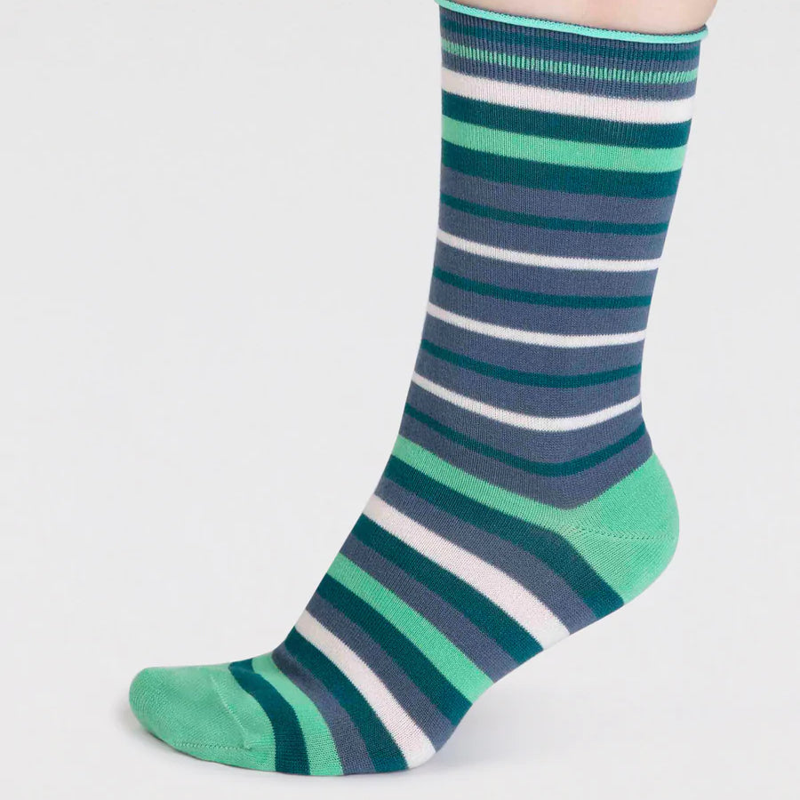 Side view of Blue, green and white striped organic cotton and bamboo sock by thought