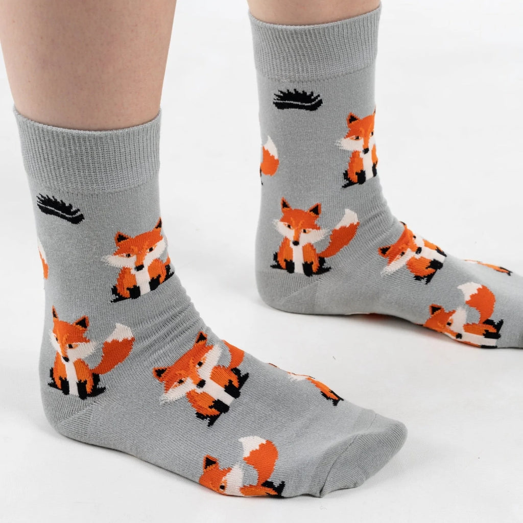 Super soft premium quality bamboo socks with an orange Fox print on a grey background 