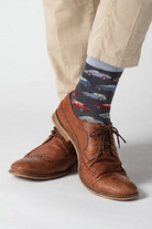 Bamboo socks featuring car designs on a light grey background