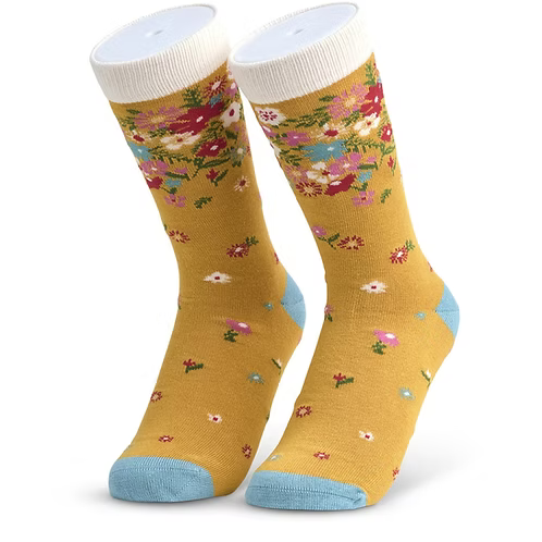 Pair of mustard yellow socks with floral pattern and blue toes 