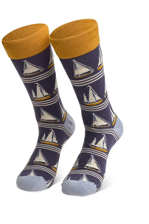 Pair of socks with sailboat pattern