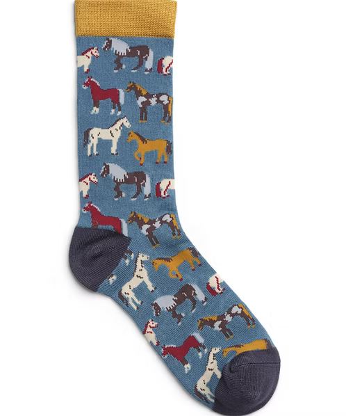 Bamboo socks with horse pattern on a blue background