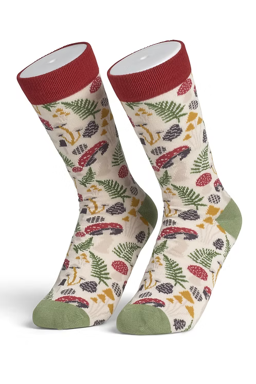 Pair of socks with a nature-themed pattern on a white background