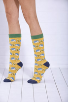Yellow socks with hedgehog pattern