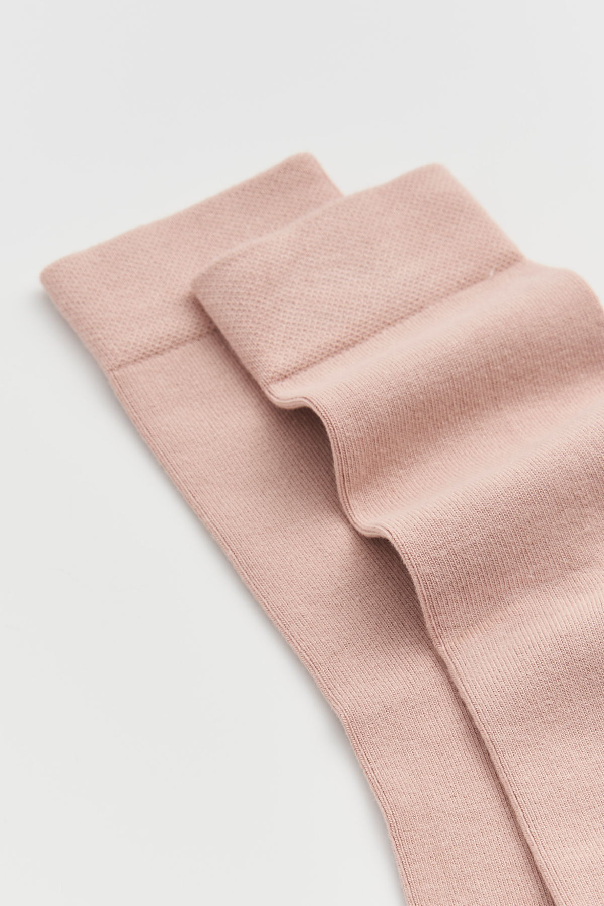 Close-up of Faded Pink bamboo socks by Pairs Scotland