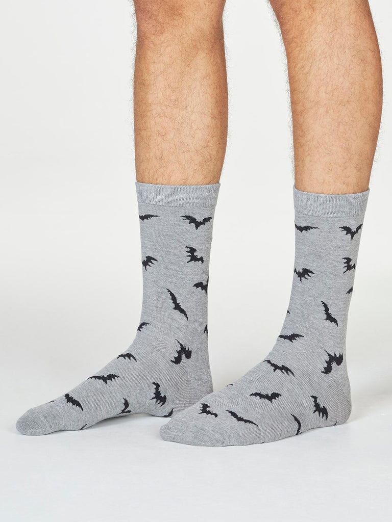 Front view of super soft premium bamboo socks featuring a spooky bat design with a grey background.