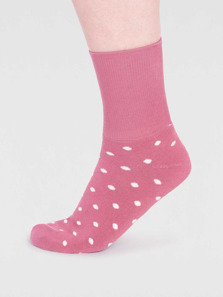 Pink thick organic cotton socks with white polka dots