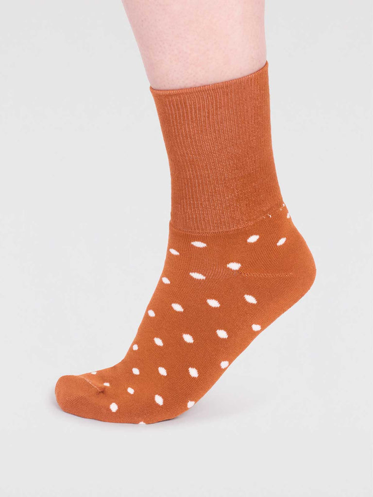 Orange thick organic cotton socks with white polka dots