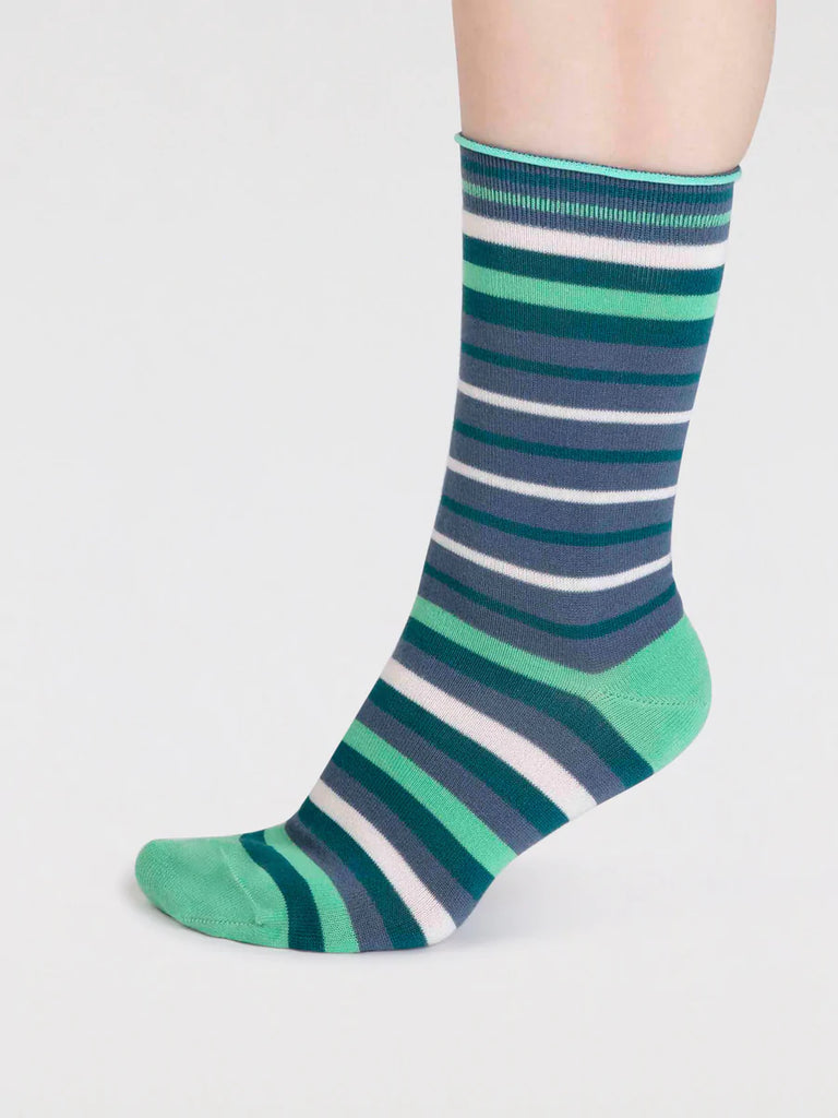 Side view of Blue, green and white striped organic cotton and bamboo sock by thought