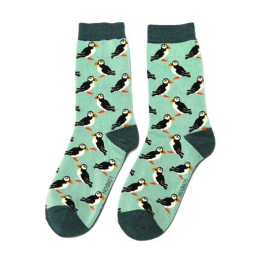 A pair of mint-coloured bamboo socks with a puffin bird pattern